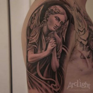 Angel tattoo by @arclighttattoo
