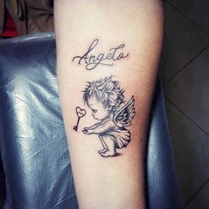 Angel tattoo by @lartesulcorpo