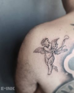 Angel tattoo by @tattoo_e_ink
