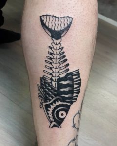 fish tattoo by @tattoo.lenny
