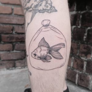 fish tattoo by @will_koffman_tattoo