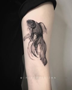 fish tattoo by @winterborn_ink