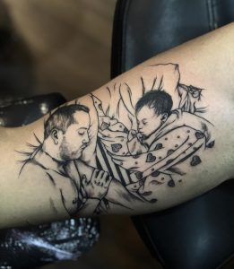Tattoo dad and son
