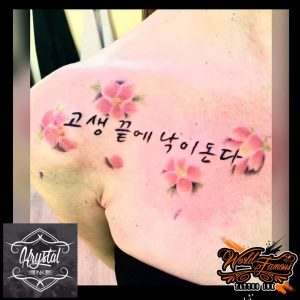 tattoo fiore di pesco by @krystal_ink_studio