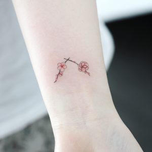 Tatuaggio piccolo fiori di ciliegio