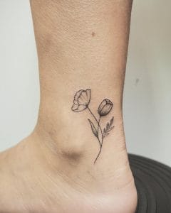 tulip tattoo by @dr.kate.tattoo