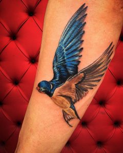 swallow tattoo by @simone_pettorossi_tattoos