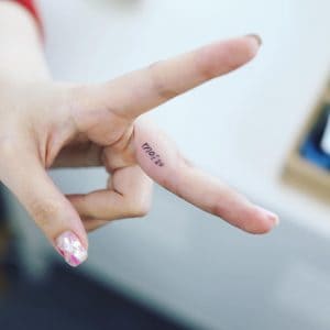 small written tattoos