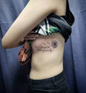 tatuaggio soffione con scritta costato by @ahbeesiang