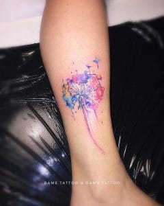 watercolor dandelion tattoo by @dame_tattoo