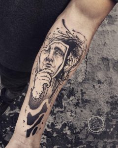 mask tattoo by @conio_polifamous