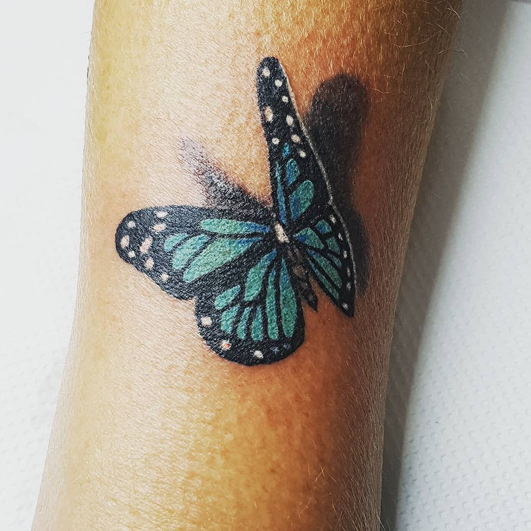 tatuaggio-farfalle-realistiche-by-@coreinktattoo