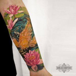 Tattoo carpa koi e fiori di loto