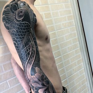 Tattoo fiore di loto carpa koi