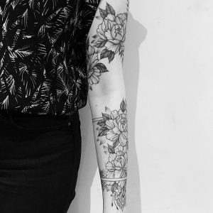 tattoo black lines flowers by @evavanoverbeeke at @inkdistrictamsterdam