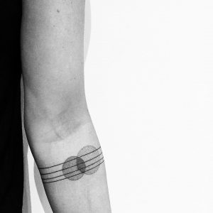 tattoo black lines and circles by @evavanoverbeeke at @inkdistrictamsterdam