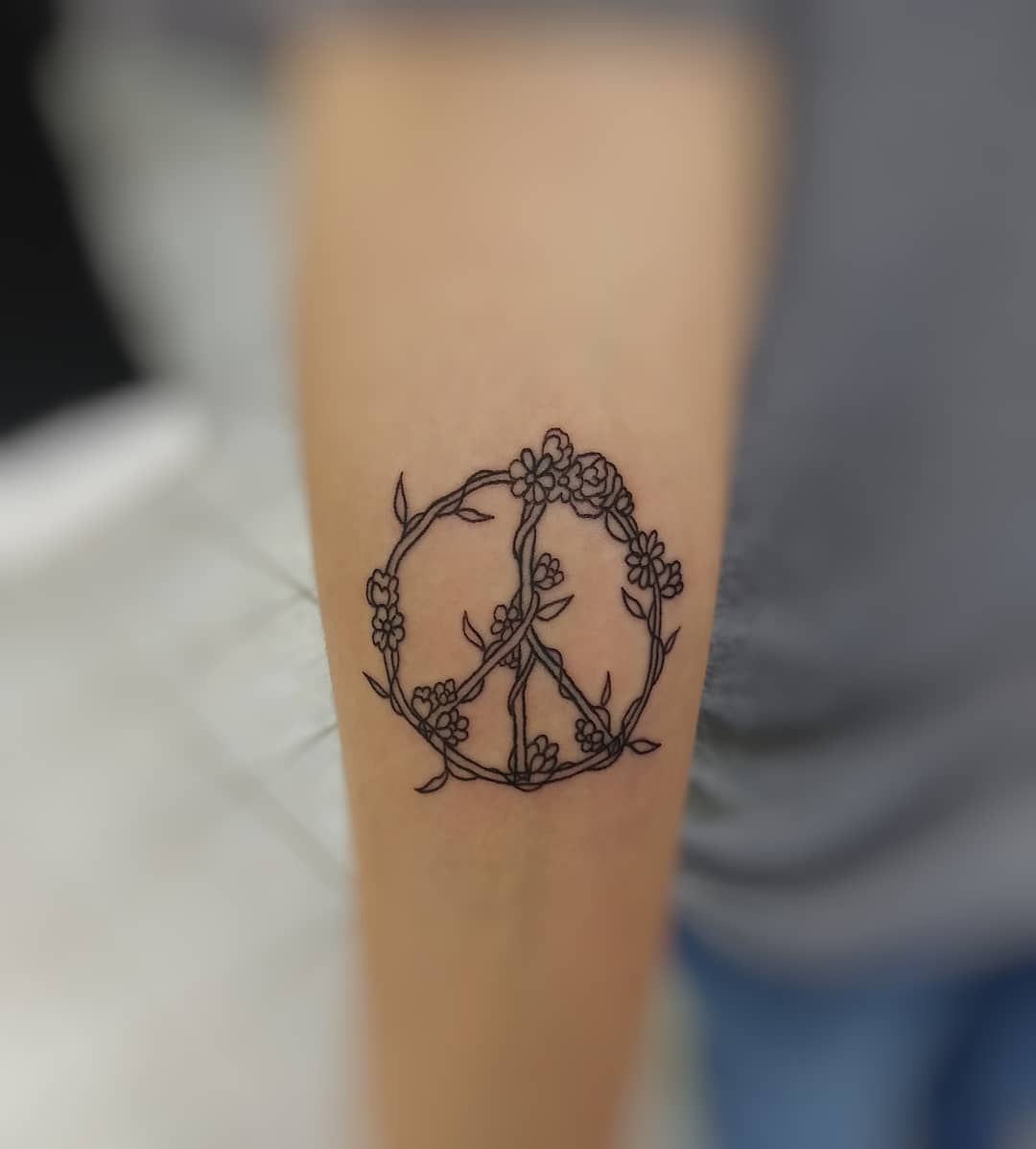 Tatuaggio simbolo pace by @cassinii